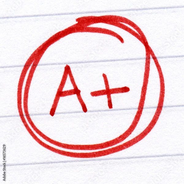 Obraz A+ grade written on a test paper.