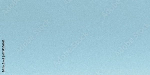 Fototapeta A light blue textured background with a subtle grain creates a calming and versatile surface for various design applications