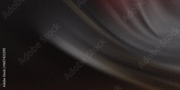 Fototapeta A somber abstract background with blurred motion creates a textured canvas of black, gray, and subtle light gradients