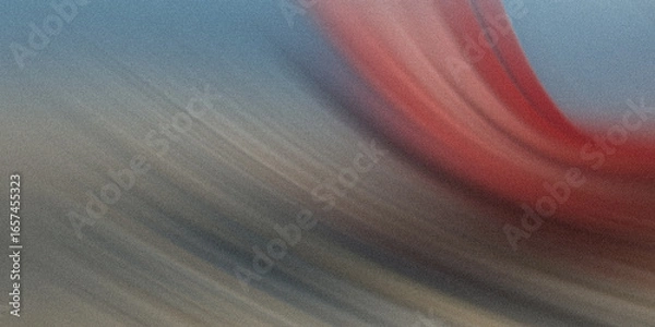Fototapeta Gradients of red, blue, and gray blend in an abstract background with blurred motion and a textured, dynamic pattern