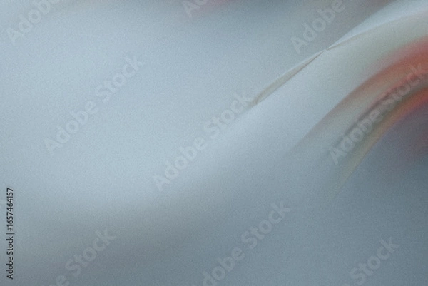 Fototapeta A grainy gray abstract background with smooth, blurred curves creates a modern and artistic textured surface