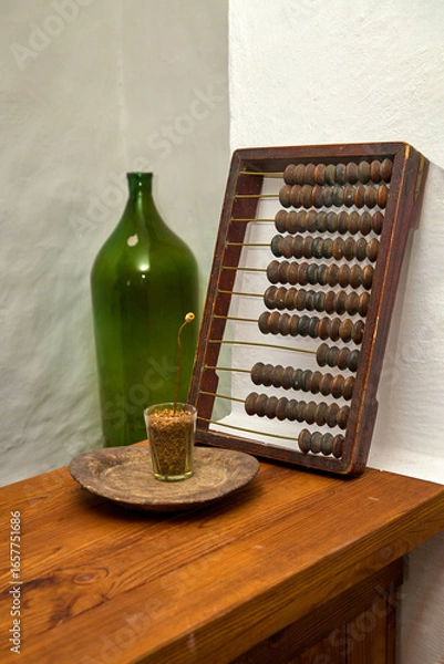 Obraz old abacus on a wooden surface