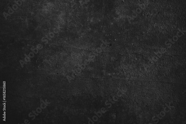 Fototapeta Dark gray textured surface suitable for backgrounds in design projects needing a rugged, industrial look. Great for website backgrounds.