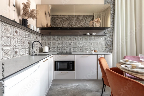 Fototapeta Modern Kitchen with Patterned Tiles and Elegant Dining Area