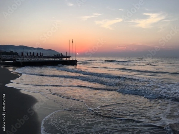 Obraz alba sul bagnasciuga