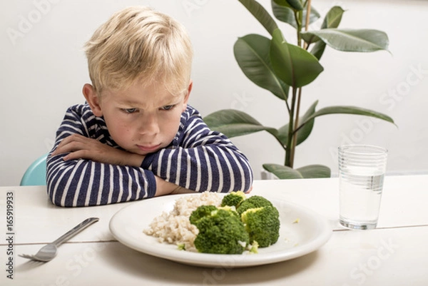 Fototapeta young kid refusing to eat