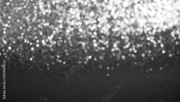 Obraz Abstract silver glitter bokeh on dark background