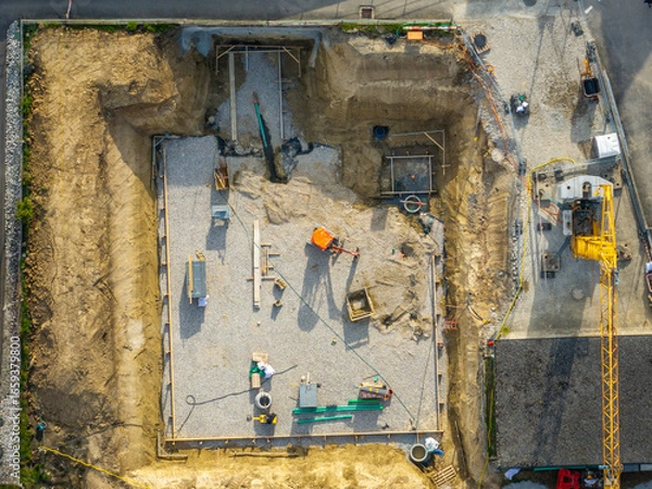 Obraz Aerial view of construction site in Switzerland. Crane for building a new house.