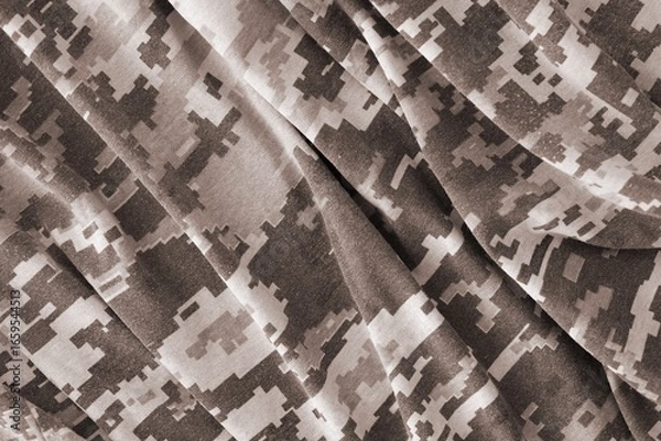 Fototapeta Texture of Dark green pixel camouflage military uniform textile cloth with folds