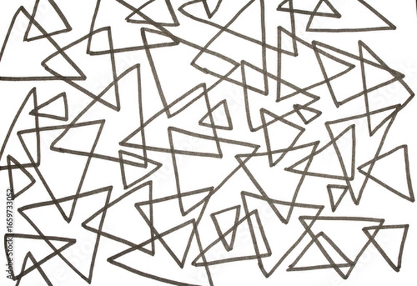 Fototapeta Close up of hand drawn doodle pen triangle square black lines and waves on white background