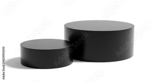 Fototapeta Two black cylindrical podiums, one smaller atop a larger one, set against a white background, showcasing a minimalist product display concept ideal for presentations or branding