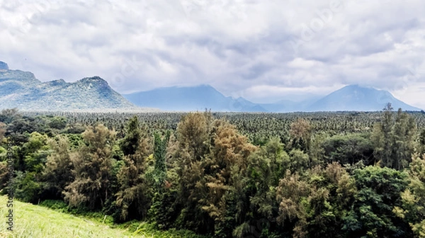 Obraz Mountain scenery view with river and cloudy skies