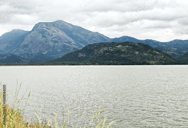 Obraz Mountain scenery view with river and cloudy skies