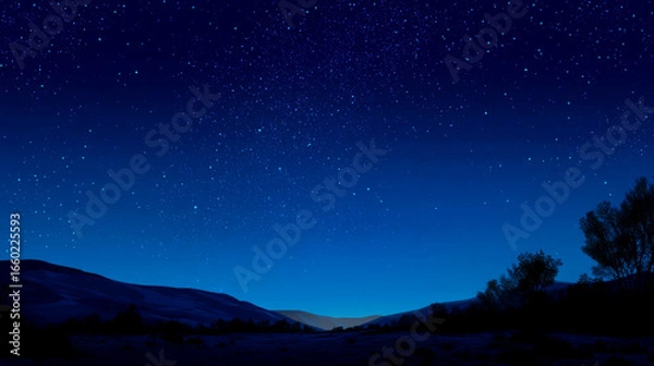 Fototapeta Starry night sky over quiet desert, deep blue tones, soft moonlight, serene and tranquil.