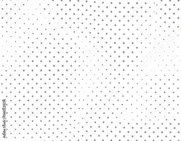 Obraz A repeating pattern of small grey circles on a white background creates a subtle visual effect.
