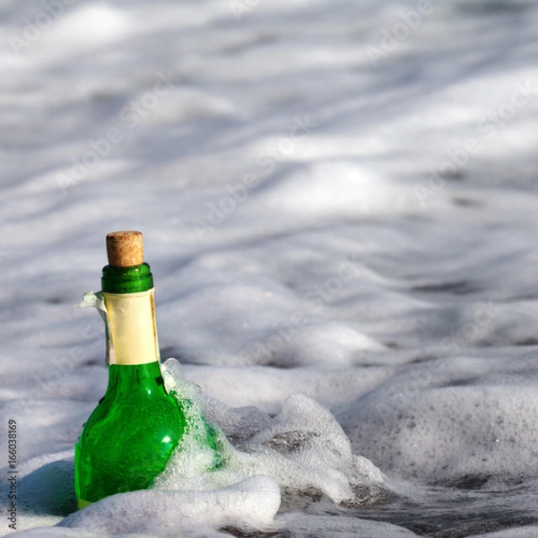 Fototapeta Bottle of wine in sea surf