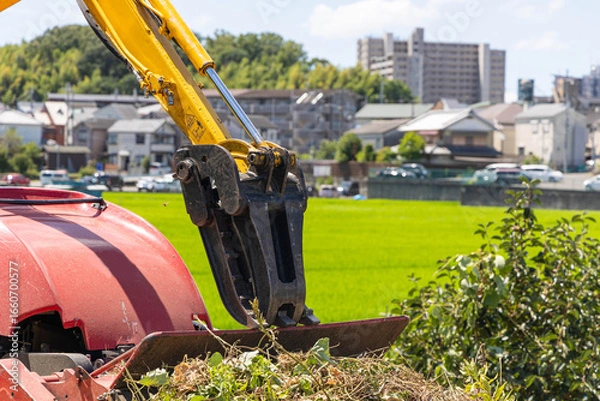 Fototapeta 油圧ショベルと草刈り重機