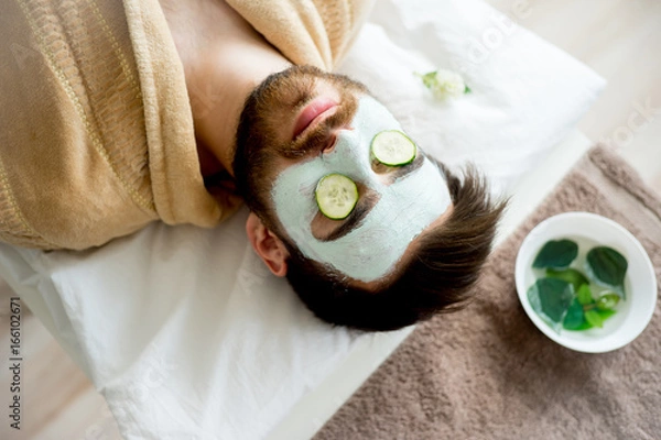 Fototapeta Man with a clay mask