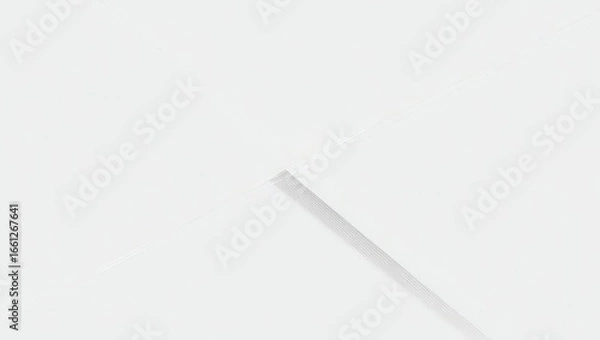 Fototapeta A simple image of a white straw diagonally placed on a white background with soft shadows present