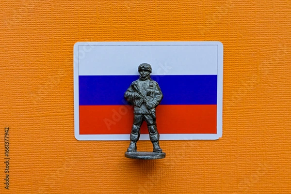 Fototapeta Flags of Russia on a yellow background. The Russian-Ukrainian conflict.