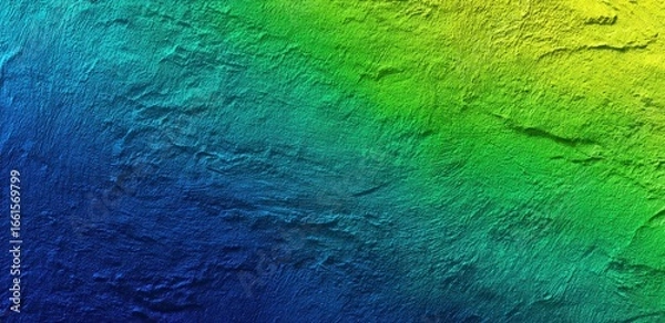 Fototapeta Vibrant textured surface with a gradient of blue, green, and yellow.