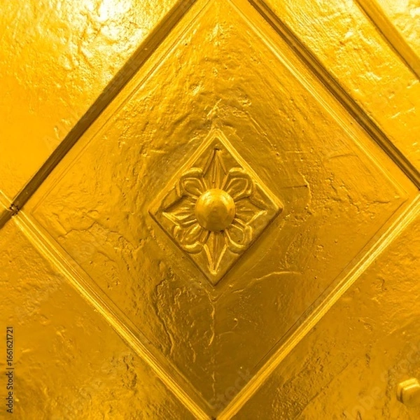 Fototapeta Golden, intricate diamond-patterned surface