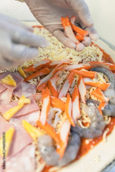 Obraz Pizza waiting to be baked outside the oven