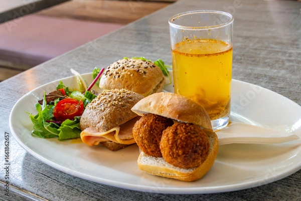 Obraz delicious cafe lunch of deep fried snacks, soup and salad