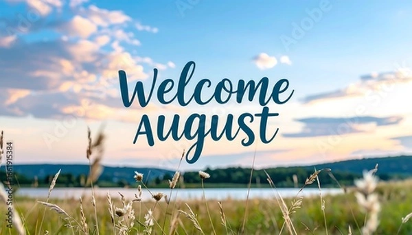 Fototapeta Welcoming August Text Overlooking Field with Sky Background