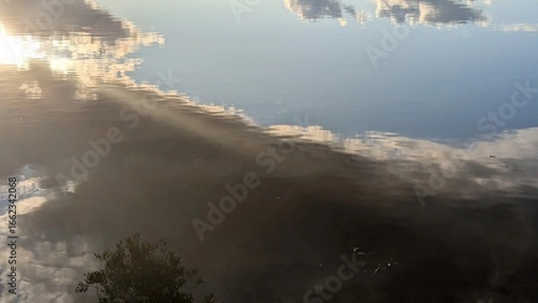 Obraz clouds over the water