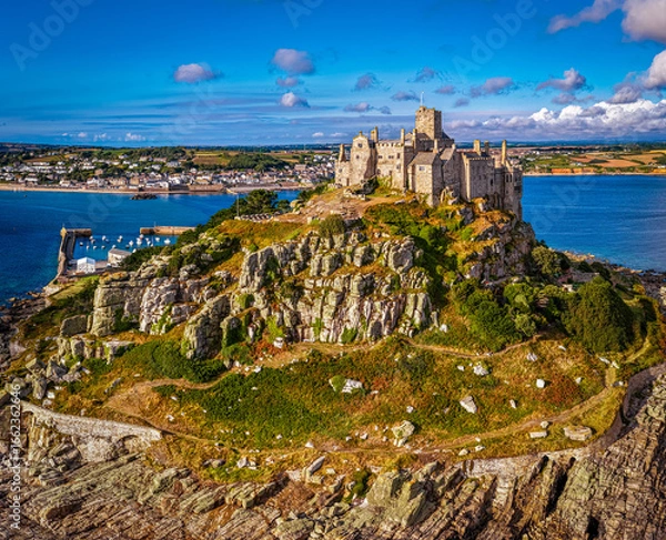 Fototapeta Aerial view of St Michael’s Mount island with harbor, boats, and castle