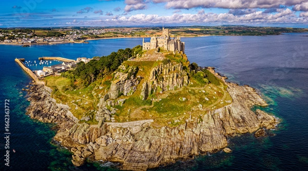 Fototapeta Aerial view of St Michael’s Mount island with harbor, boats, and castle