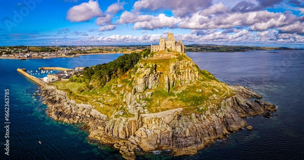 Fototapeta Aerial view of St Michael’s Mount island with harbor, boats, and castle