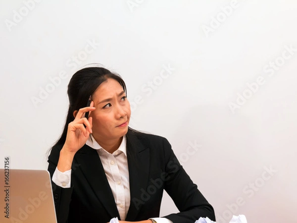 Obraz Asia woman thinking about her work