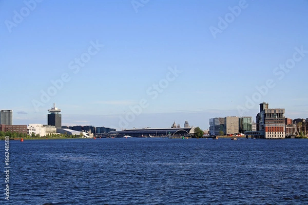 Fototapeta View of Amsterdam from other coast of channel