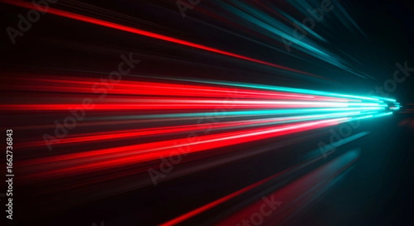Fototapeta Dynamic light streaks in vibrant red and teal hues against a dark background