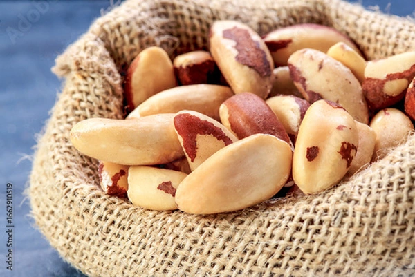 Obraz Fresh Brazil Nuts in Burlap Sack