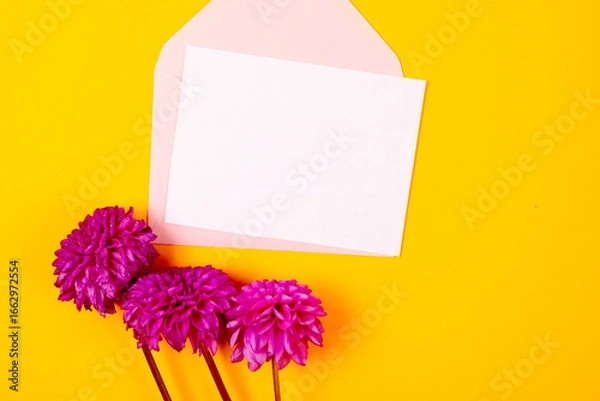 Obraz Blank greeting card mockup with pink envelope and purple dahlias flowers