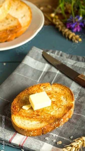 Obraz Toasted bread with butter