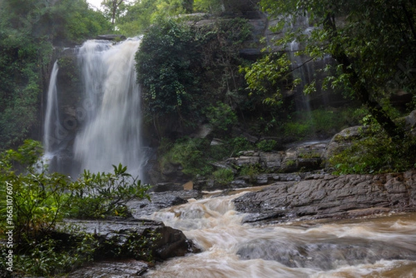 Obraz A Serene Waterfall Flowing Gracefully.