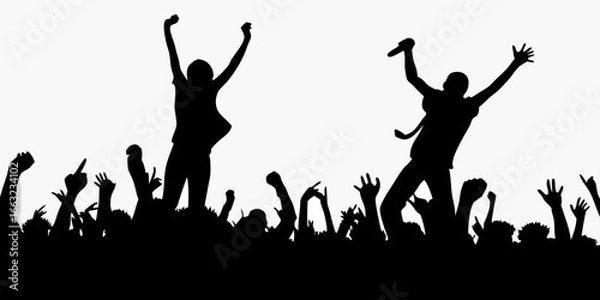 Fototapeta Silhouette of cheering crowd with raised hands at a concert
