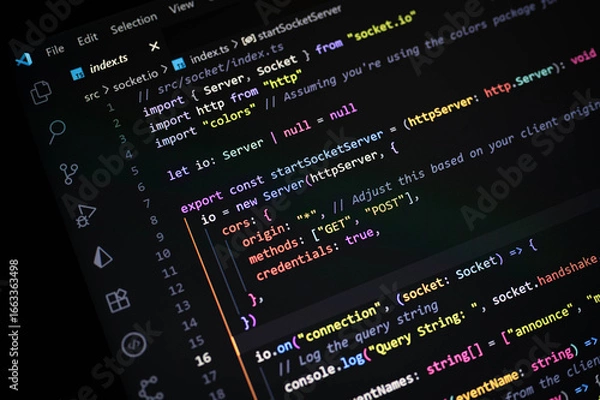 Obraz Close-up of colorful TypeScript code with socket.io implementation on Visual Studio Code editor, highlighting real-time web communication, server connection, and backend programming workflow.