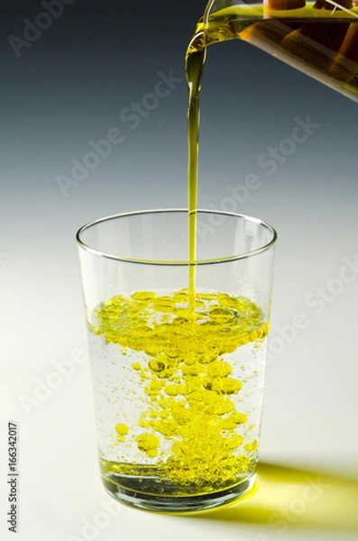 Fototapeta Physics. Immiscible fluids, oil and water. 2 of 4 image series.