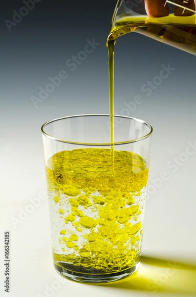Fototapeta Physics. Immiscible fluids, oil and water. 3 of 4 image series.