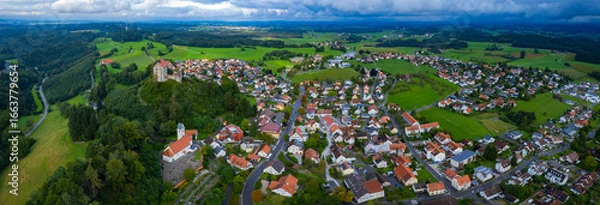 Obraz Aerial view of the village Waldburg in Germany on a cloudy afternoon in summer