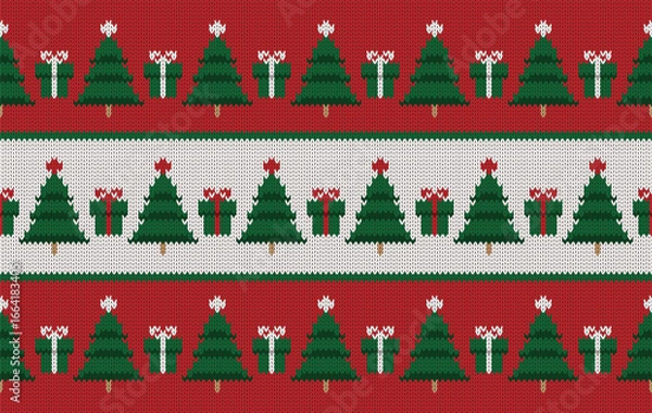 Fototapeta Knitted pattern seamless fabric Christmas tree and gift. traditional knitted pattern vector. Designed for knitted pattern ,fabric ,background ,wallpaper ,Christmas ,embroidery ,carpet ,textile