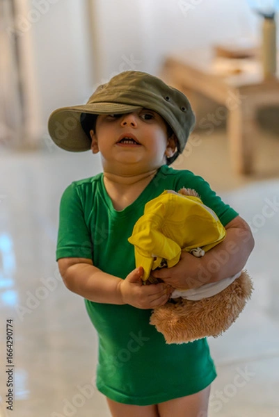 Obraz Emerson wearing Dad's hat