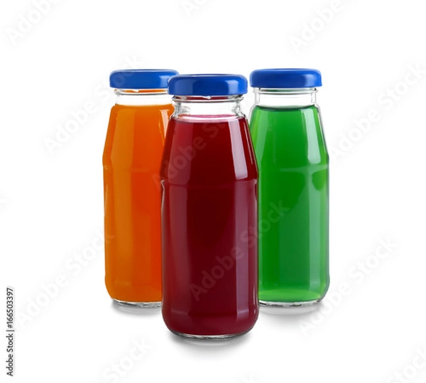 Fototapeta Different juices in bottles on white background