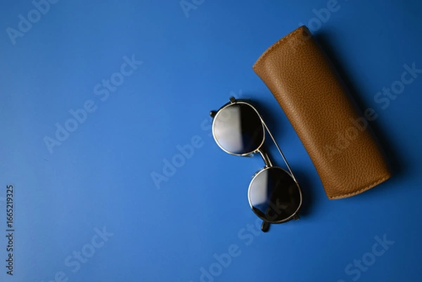 Obraz vintage sunglasses on blue background