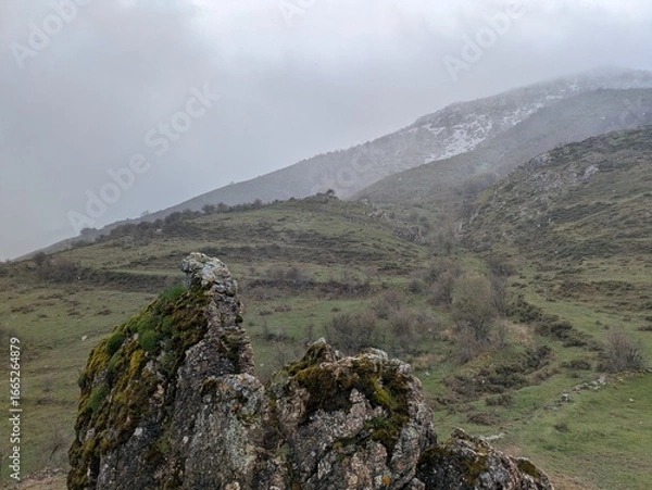 Obraz spring snow over mountains and green valleys